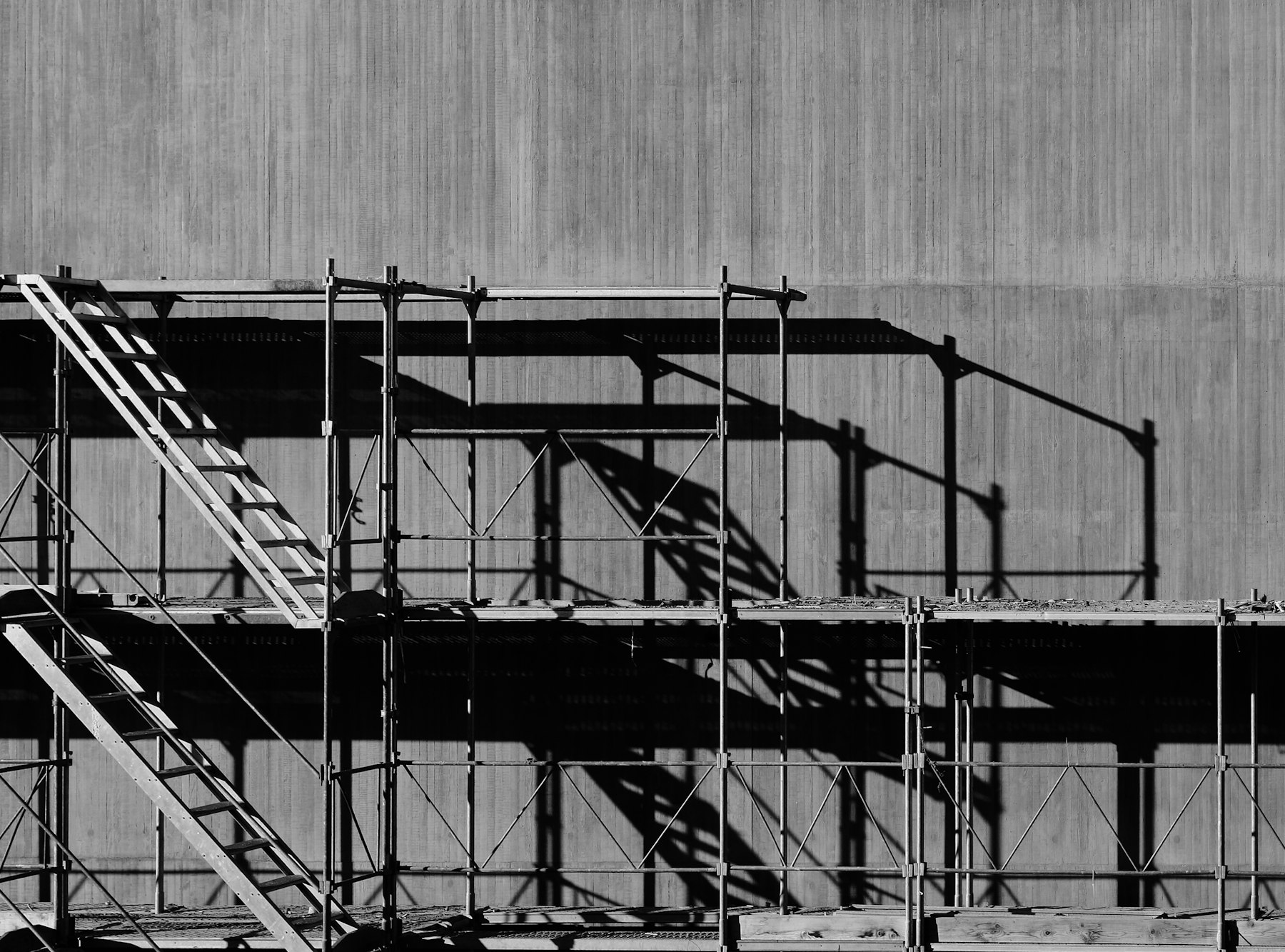 Scaffolding and a construction site in wet weather conditions.